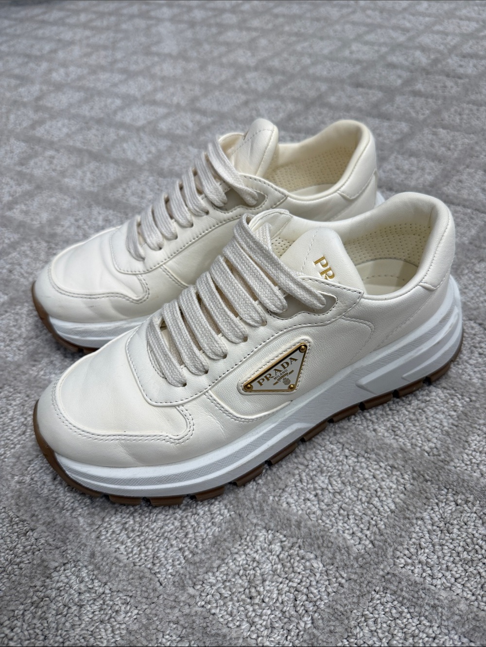 Prada Cream Leather Platform Sneakers with Gold Logo